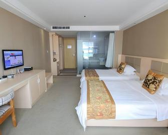 Shell Putian Hanjiang District Hanhua West Road Hotel - Putian - Camera da letto