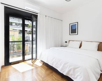 Elliot - Atenas - Habitación