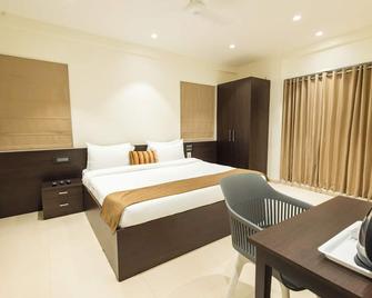Freesia Residency by Express Inn - Nashik - Slaapkamer