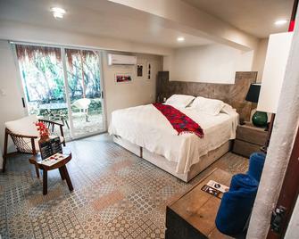 Hotel Paradise Suites - Ісла-Мухерес - Спальня