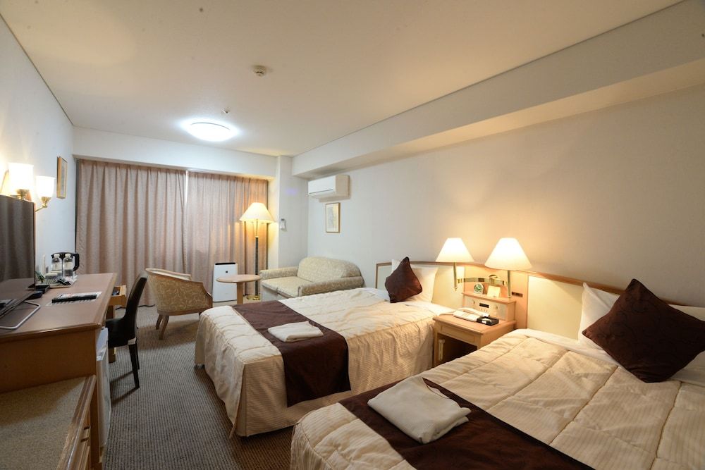 Sunwest Hotel Sasebo - Sasebo - Schlafzimmer