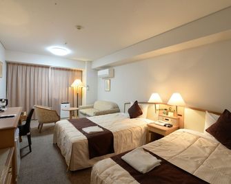 Sunwest Hotel Sasebo - Сасебо - Спальня