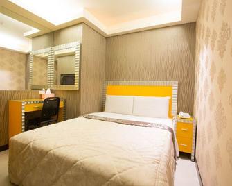 Happy Hotel - Kota Taipei - Kamar Tidur