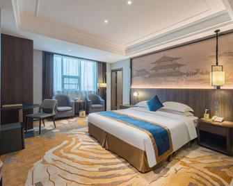 Jing Gang Great Cause Hotel - Ji'an - Bedroom