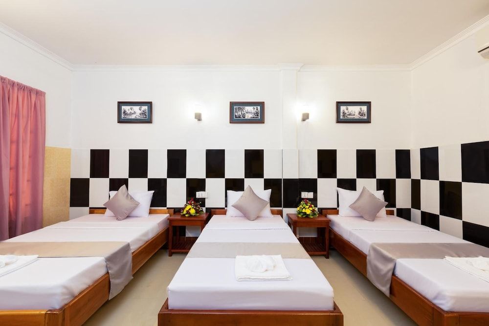 Botoum Hostel - סיאם ריפ - חדר שינה