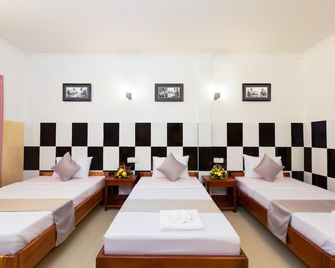 Botoum Hostel - סיאם ריפ - חדר שינה