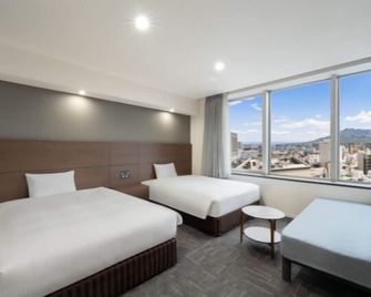 Hotel Oriental Express Kagoshima Tenmonkan - קאגושימה - חדר שינה