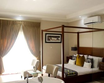 Staymorr Boutique Guest House - Maun - Slaapkamer