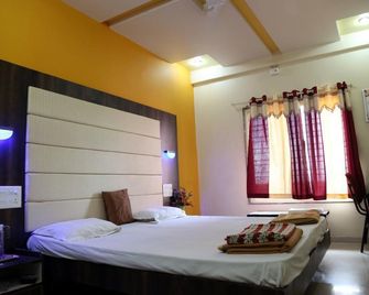 Hotel Pooja Residency - Satara - Habitación