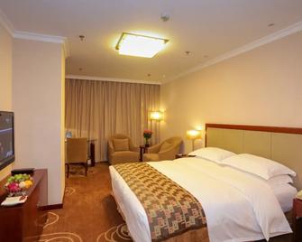 Sunstone Plaza Hotel - Binzhou - Bedroom
