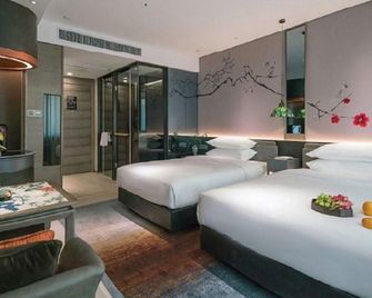 Huangpu Hotel - نانجينغ - غرفة نوم
