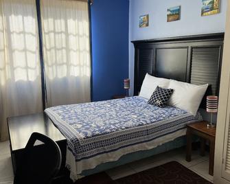Cool Running Apartments - St. George's - Bedroom