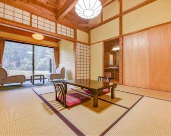 Hirayama Onsen Ryokan Kadoya - Yamaga - Bedroom