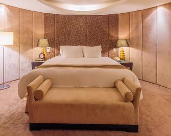 Tempus Hotel - טאיצ'ונג - חדר שינה