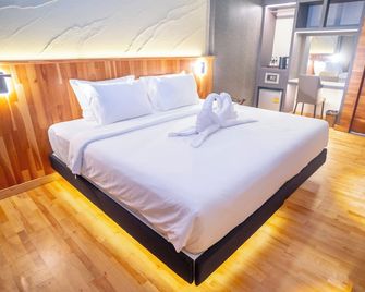 Diamond Hotel - Buri Ram - Спальня