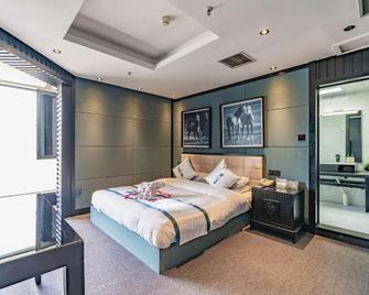 Xinjiang Yema International Clubhouse - אורומצ'י - חדר שינה