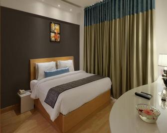 Melange Luxury Serviced Apartments - Bengaluru - Bedroom