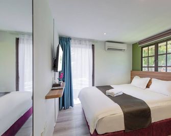 Gaia Hotel - Tanjung Bungah - Спальня