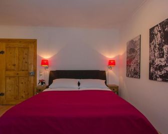 Altstadt Ferienwohnung Guade Zeit - Füssen - Bedroom