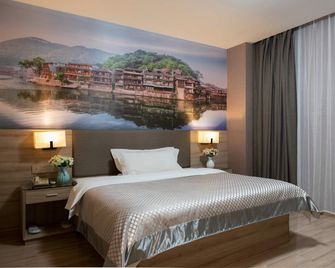 Morning Inn Style Hotel (Loudi Marriott City Plaza Chunyuan Pedestrian Street Diamond Street) - Loudi - Bedroom