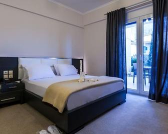 Pearl Bay Hotel Apartments - Vrontádos - Schlafzimmer