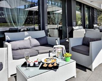 One Hotel & Restaurant - Dalmine - Innenhof