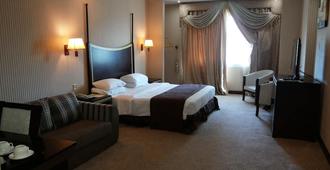 Tourist Hotel - Doha - Schlafzimmer