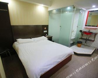 Huile Holiday Hostel - Shanghai - Bedroom