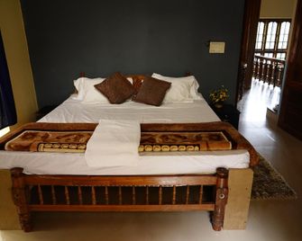 Hotel O Cardamom Rock Inn - Elappara - Bedroom