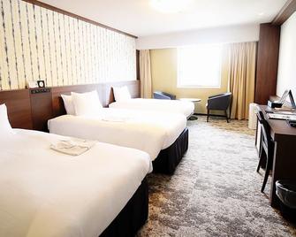 Richmond Hotel Kochi - Кочі - Спальня