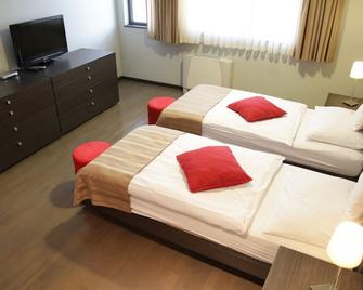 Birokrat Hotel - Ljubljana - Schlafzimmer
