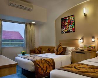 Lemon Tree Hotel, Udyog Vihar, Gurugram - גורגאון - חדר שינה
