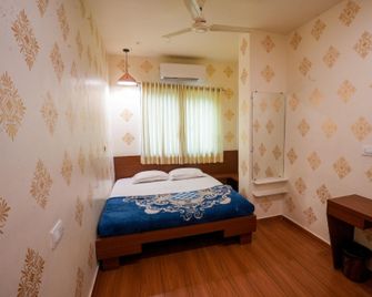 Tulsi Hotel - Nadiād - Habitación