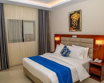 Geneva Hotel - Douala - Bedroom