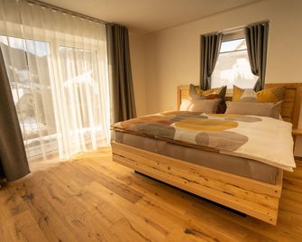 Bergzauber Appartements - Rennweg - Sypialnia