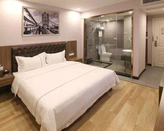 G Chu Chain Hotel (Jianli) - Jingzhou - Slaapkamer