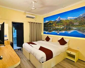 Hotel Peaceland Lumbini - Lumbini Sanskritik - Ložnice