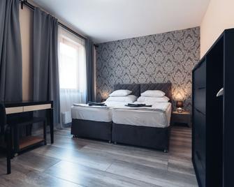 Végvári Hotel Eger - Eger - Bedroom