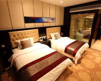 Chongqing Weitai Hotel - Chongqing - Habitación