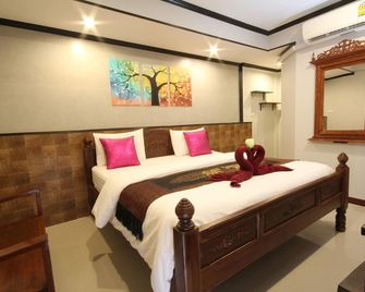 Tr Guesthouse - Сухотаі - Спальня