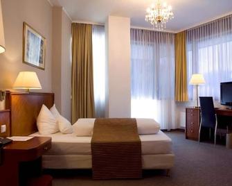 Ross Hotel - שטוטגרט - חדר שינה