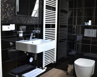 Fletcher Hotel-Restaurant Duinzicht - Ouddorp - Baño