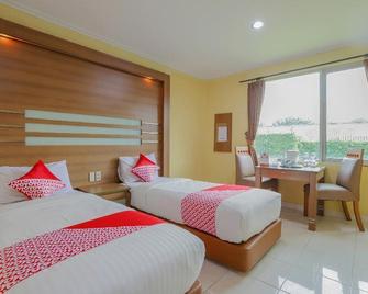 Hotel Senen Indah Syariah - Dżakarta - Sypialnia