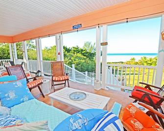 White Sand Beach just steps away! Fabulous Oceanview Porch! - Spanish Wells - Balcony