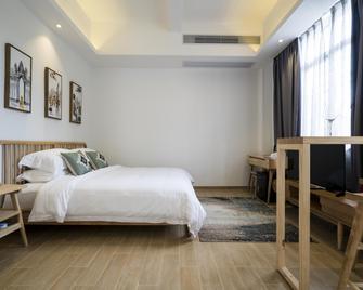 Chaozhou Sunshine Boutique Hotel - Chaozhou - Slaapkamer
