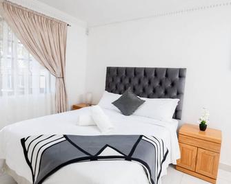 Tranquil cottage - Sandton - Yatak Odası