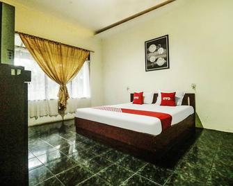 Hotel O Nyi Rindang Near Puskesmas Jekan Raya - Palangkaraya - Slaapkamer