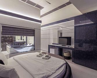 هوتل دو كوكا - سكوبي - غرفة نوم