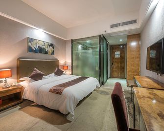 Park Lane Boutique Hotel - Nanning - Schlafzimmer