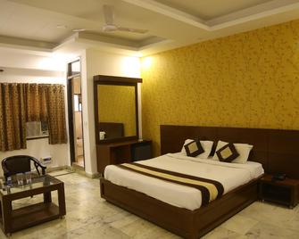 Rockwood Inn - Faridabad - Schlafzimmer